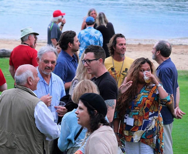 Kauai Conf-Participants and faculty mingling on the beach