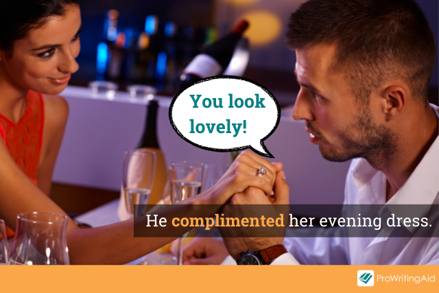 Image showing a man giving a woman a compliment about her dress at dinner