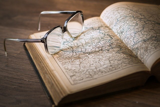 glasses on a map