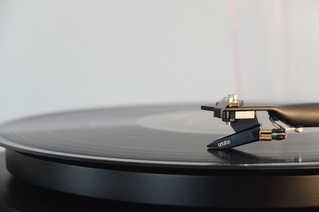 closeup of a record on a record player with the needle down