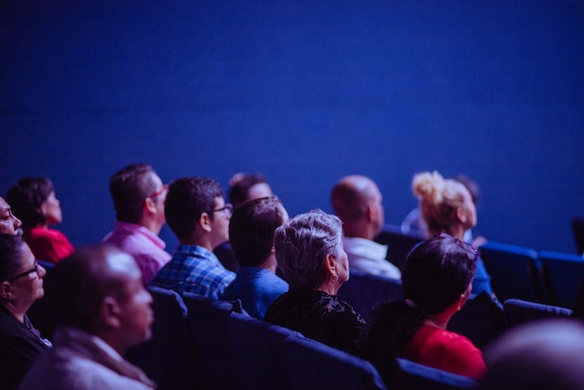 audience watching a cinema screen