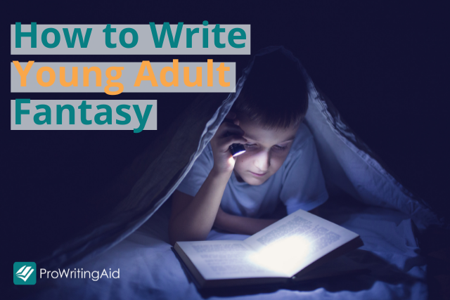 teenage boy reads by torchlight under-covers